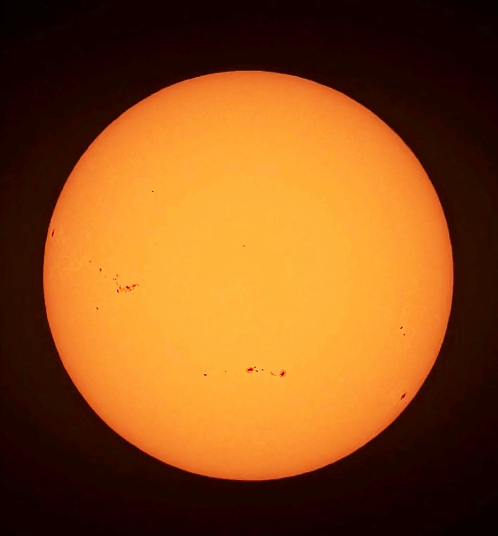 Imagen de una estrella redonda y naranja