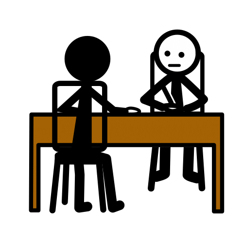 Dos estudiantes trabajando individualmente